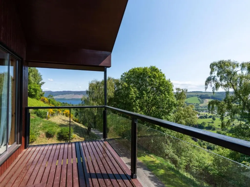 a view from the balcony of a house at Holiday Home Achmony Number 6 by Interhome in Drumnadrochit