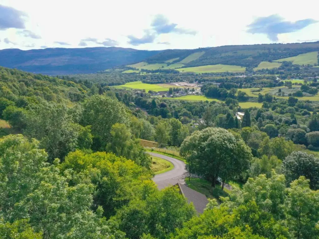 an aerial view of a winding road in the hills at Holiday Home Achmony Byre by Interhome in Drumnadrochit