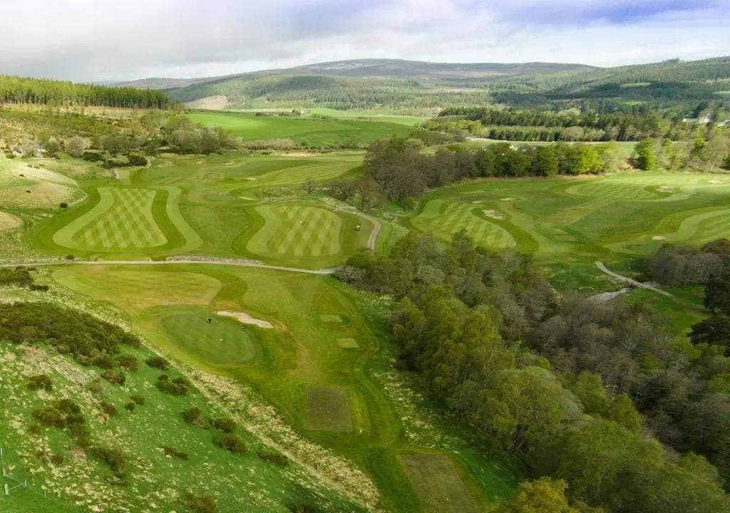 an overhead view of a lush green golf course at The Delnashaugh in Ballindalloch