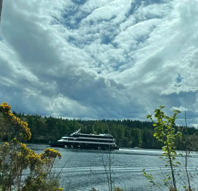 a large boat on the water under a cloudy sky at Bonny Vista in Inverness